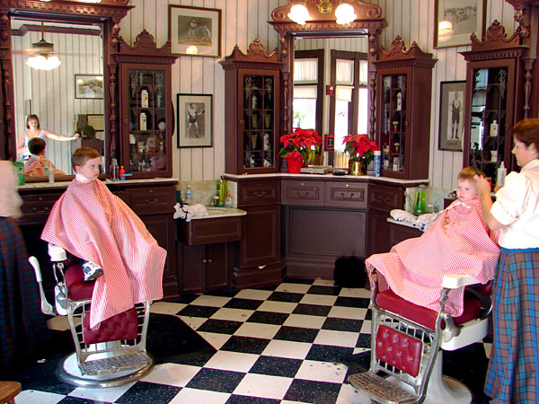 Jacob and Andrew getting their haircuts at The Magic Kingdom (130.50 KB)