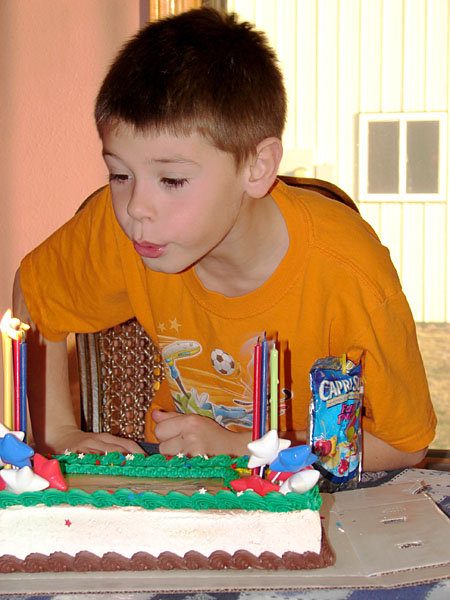 Zach blowing out his birthday candles (93.29 KB)