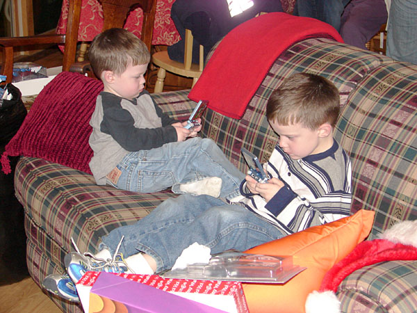 Jacob and Andrew playing their new Game Boys (121.59 KB)