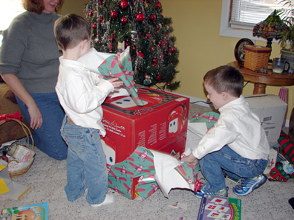 Jacob and Andrew opening up their new TV (121.95 KB)