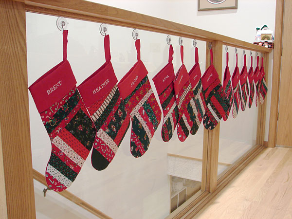 All of our home-made stockings at my in-laws' (99.58 KB)