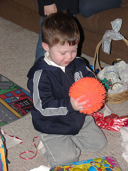 Andrew getting a gift at my dad's (107.19 KB)