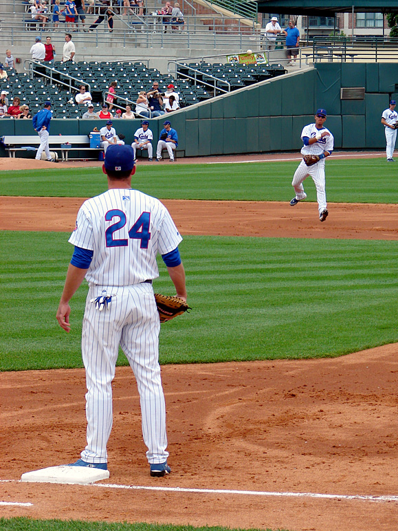 Ronny Cedeno with a throw to first at an Iowa Cubs game (314.07 KB)