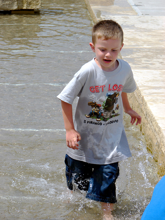 Jacob enjoying the water features in front of the new library (242.20 KB)