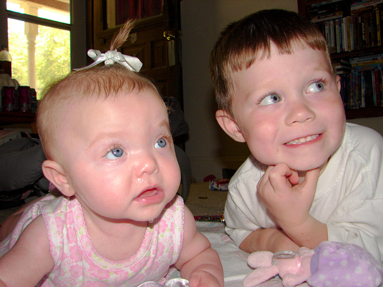 Hannah and Andrew laying on the floor together (203.33 KB)