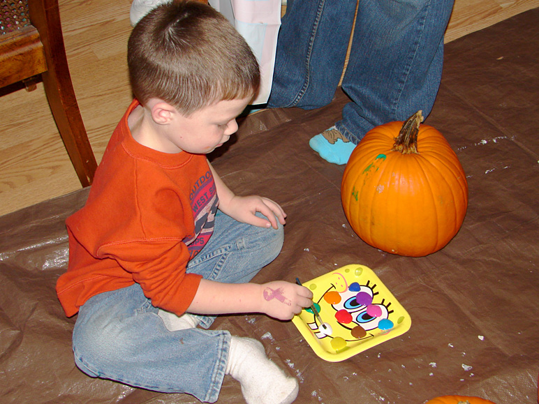 Drew painting a pumpkin (250.35 KB)