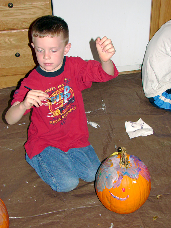 Jacob painting his pumpkin (226.77 KB)