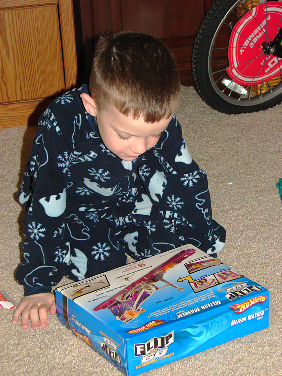 Jacob checking out one of his new gifts (307.25 KB)