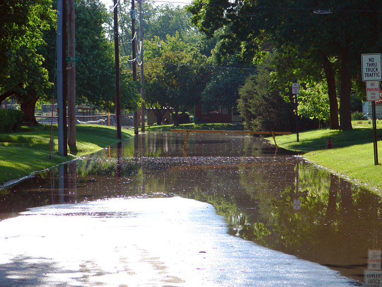 Same flood waters looking down our street (308.89 KB)