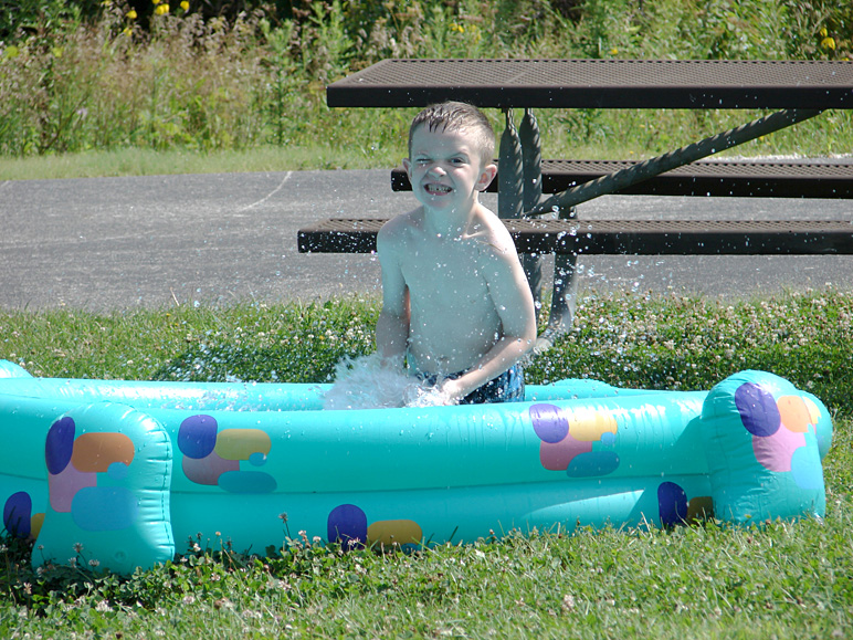 Jacob making a very weird face in the pool (317.40 KB)