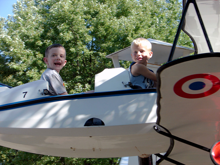 Jake and Cade on a ride at Adventureland (236.88 KB)