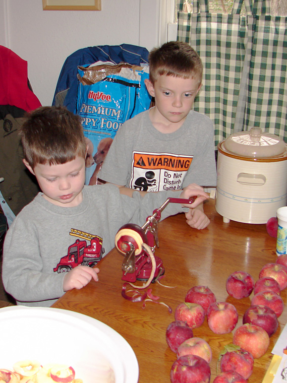 The boys helping to make apple butter (good stuff!) (226.48 KB)