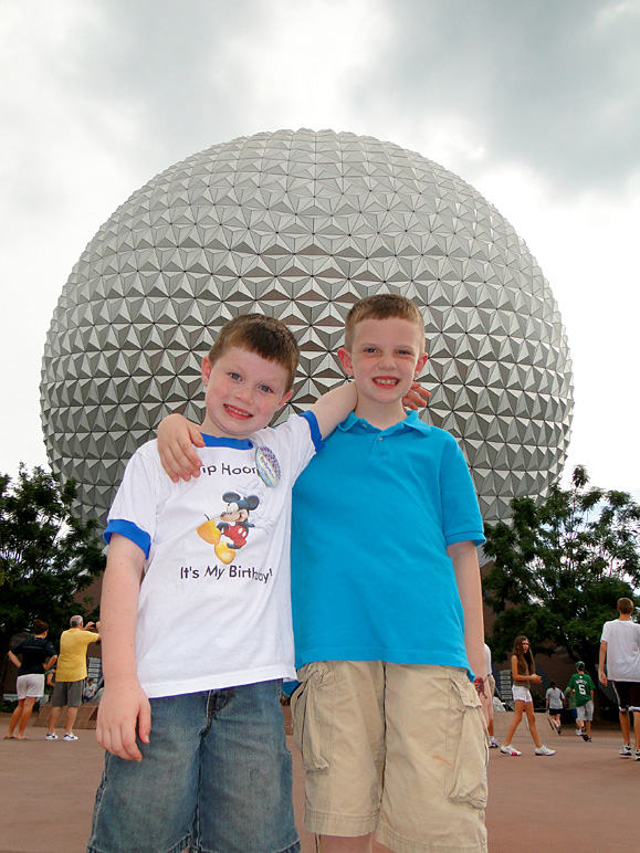 The boys in front of Spaceship Earth at Epcot (213.57 KB)