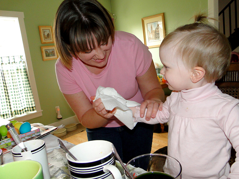 Anna cleaning up the messy hands (220.35 KB)