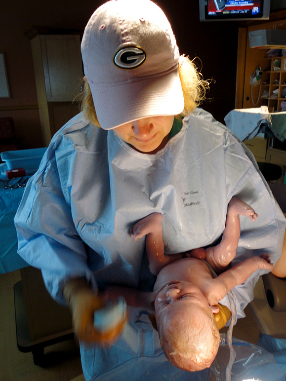 Lucas, not even a full minute old, already getting introduced to the Packers.  Ugh. (192.19 KB)