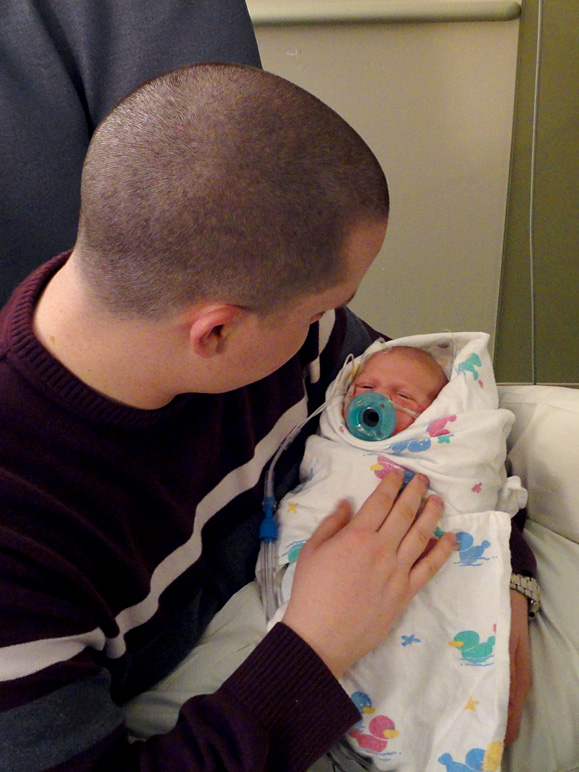 I got to hold him for a while, too.  Those tubes and wires made it awkward, but I loved it. (188.68 KB)