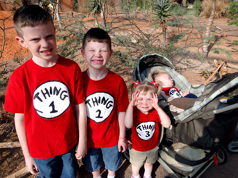 All four kids showing off their 