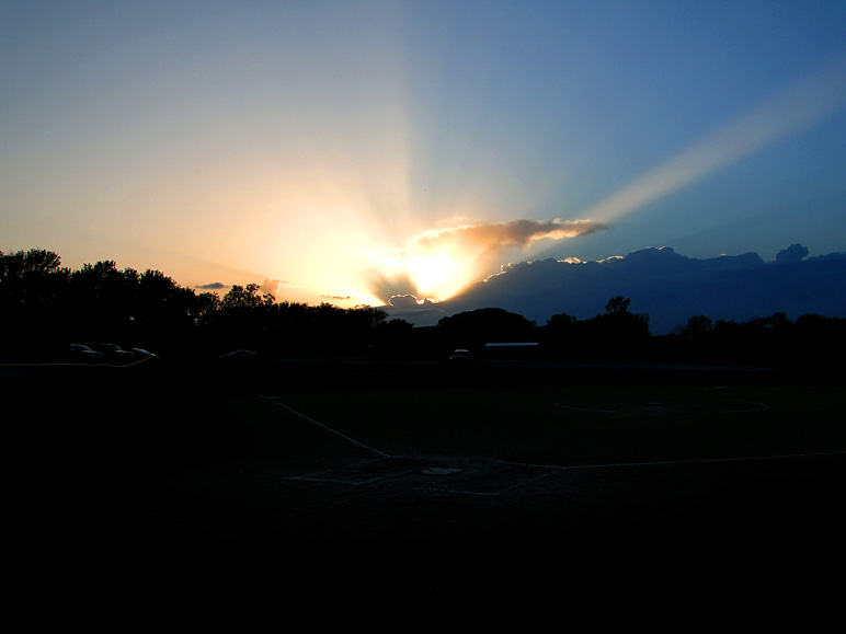 A sunset over a ball field (72.27 KB)