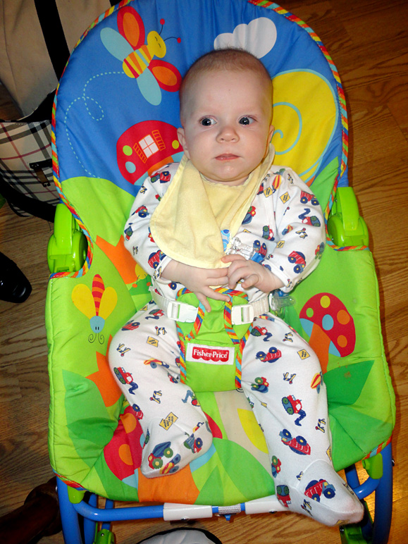 Lucas hanging out in his bouncy seat (252.94 KB)