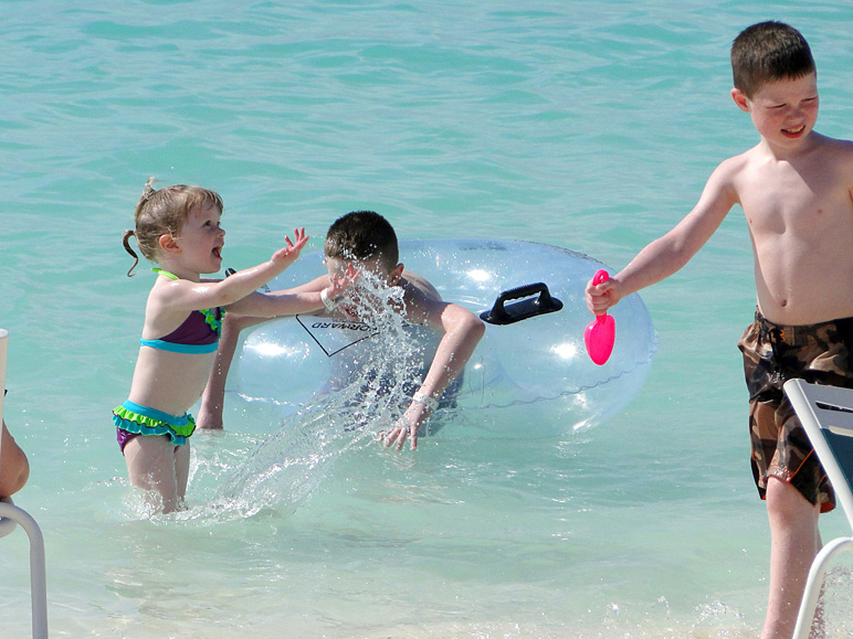 Kate, Jake and Andrew enjoying the ocean (190.31 KB)