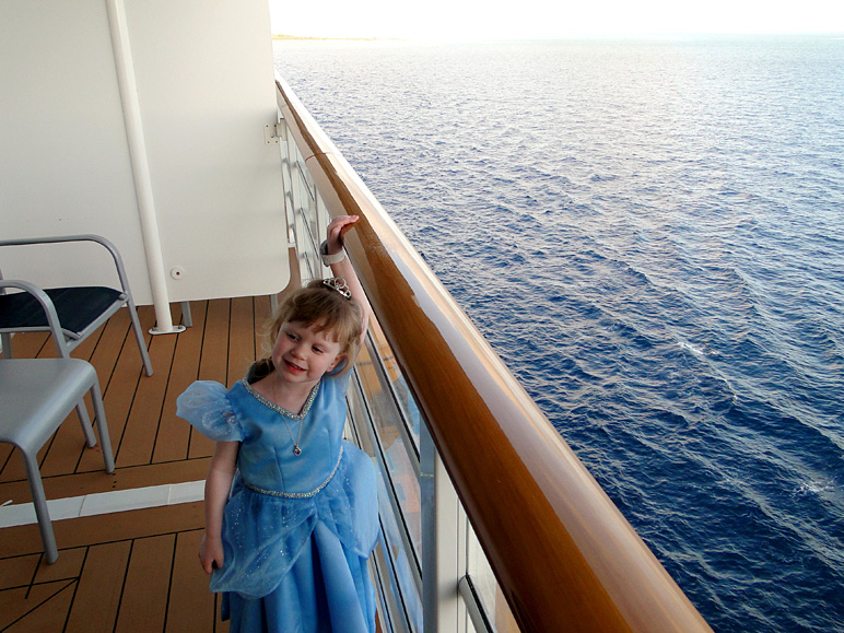 Katelyn, dressed up as Cinderella, on a Disney Dream veranda (241.26 KB)