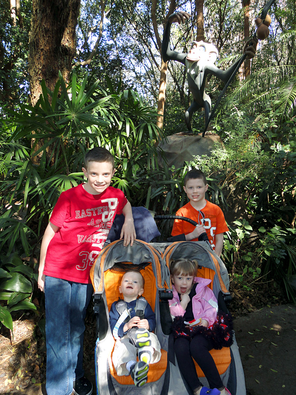 The kids at Animal Kingdom in front of Rafiki (359.69 KB)