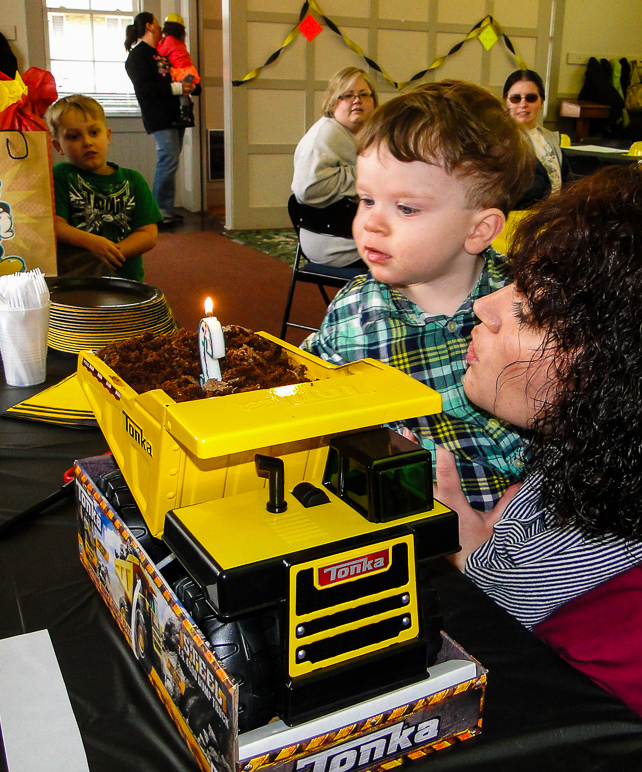 Lucas blowing out the candle on his cake. (396.46 KB)