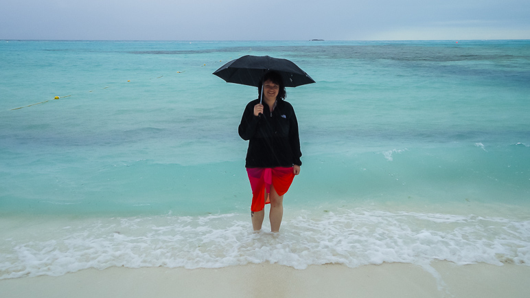 Anna ventured out into the water with her umbrella. (124.92 KB)