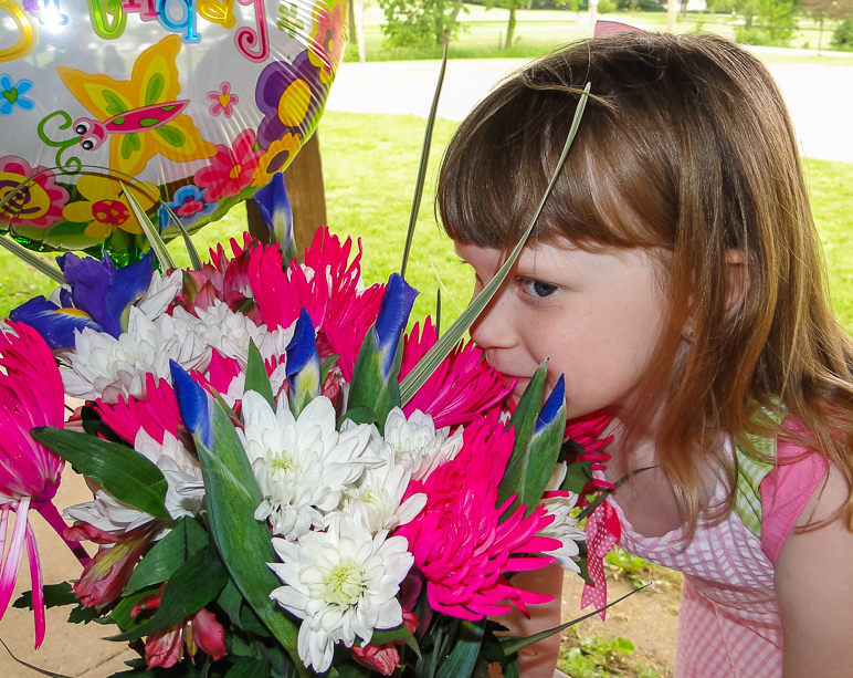 Kate smelling the flowers. (390.59 KB)