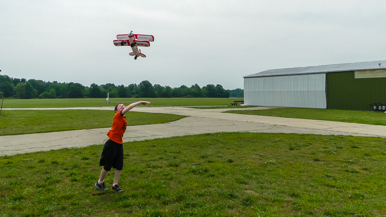 Andrew playing in front of my grandparents' hangar. (191.37 KB)