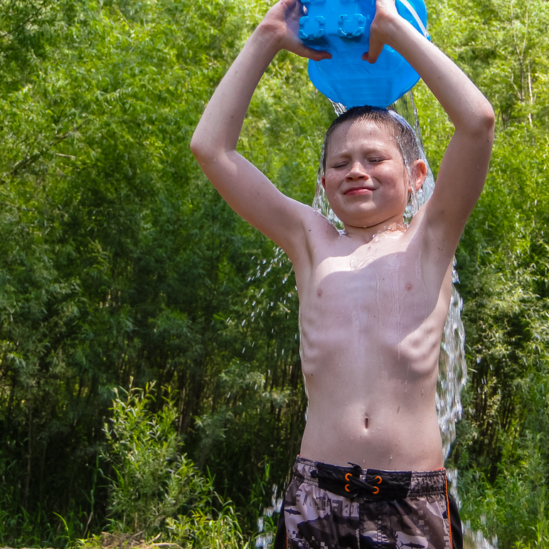 Andrew pouring water on himself. (448.84 KB)