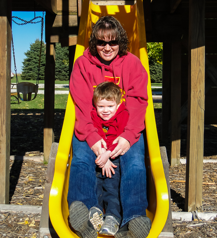 Anna and Lucas on the slide together. (386.37 KB)