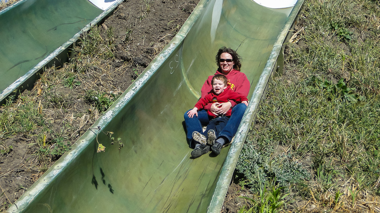 Anna and Lucas went down the slide together; I think they had fun.  :-) (314.42 KB)